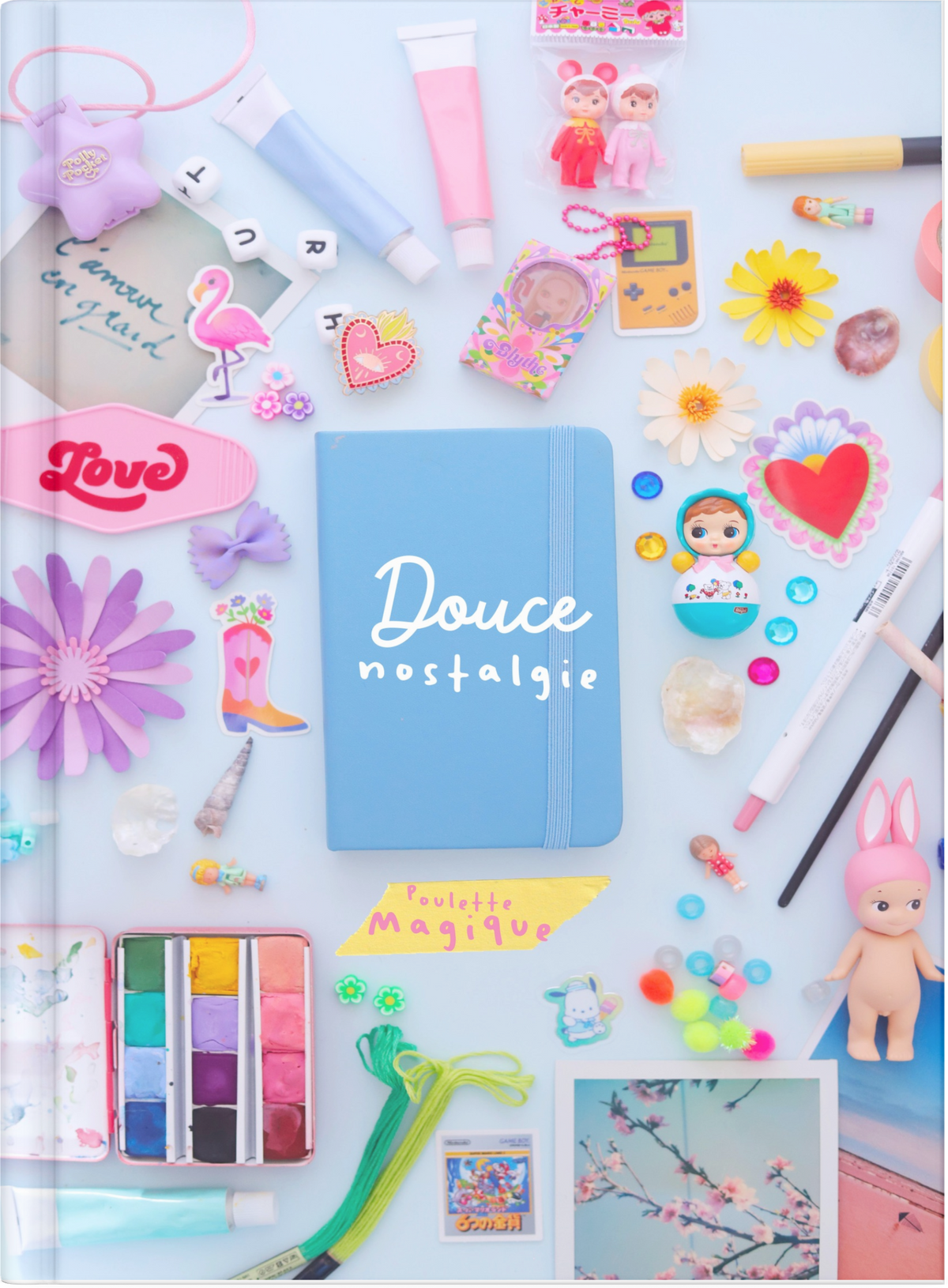 Livre "Douce Nostalgie" de Shop Magique, couverture avec illustrations douces évoquant la nostalgie et la douceur.