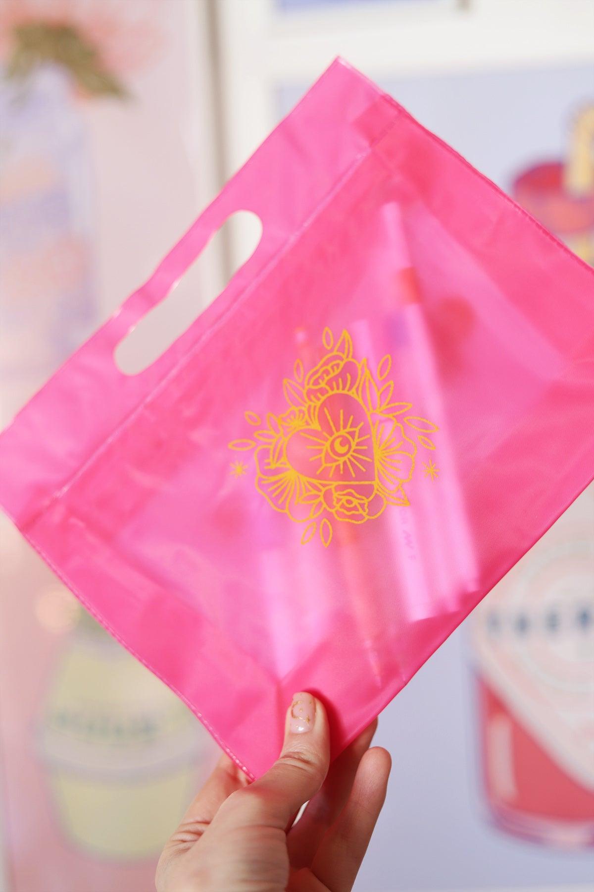 Pochette rose fluo Good Witch